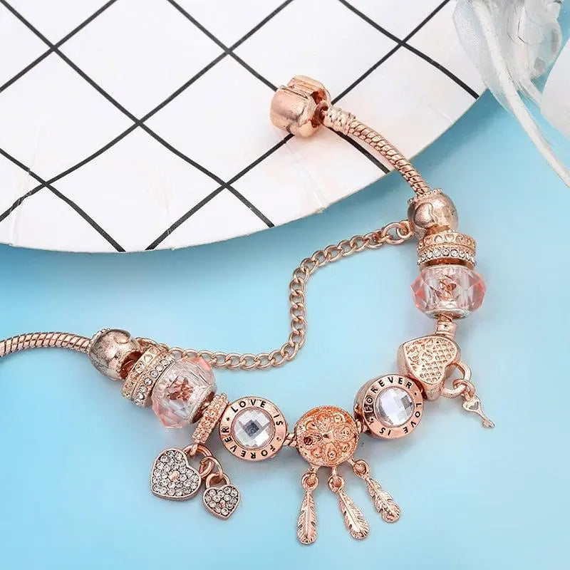 Rózsaszín Álomfogó Karkötő Ezüst Lógókkal