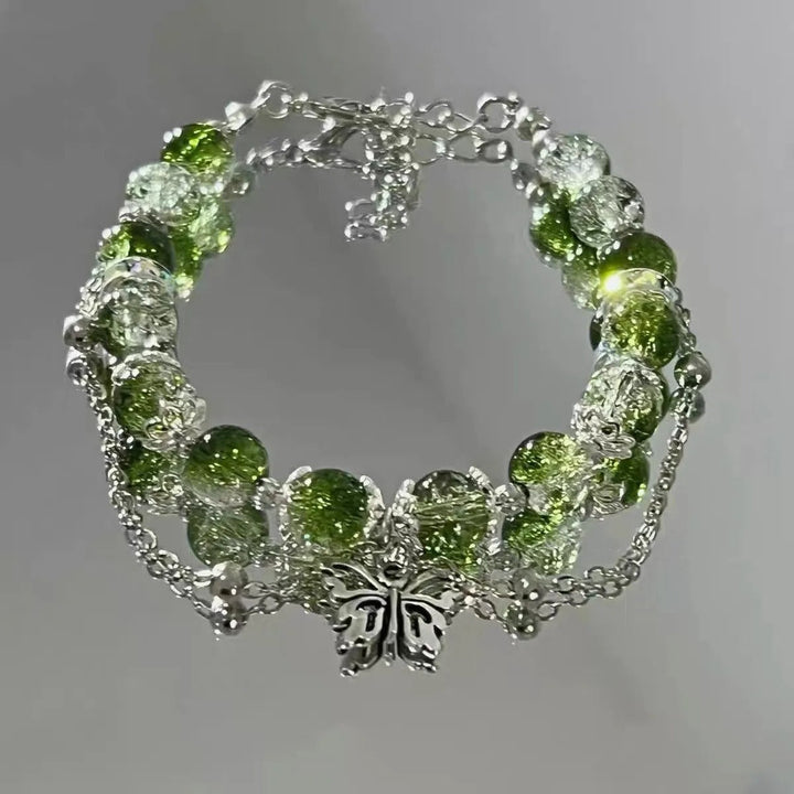 Vintage karkötő ezüst pillangóval és zöld gyöngyökkel